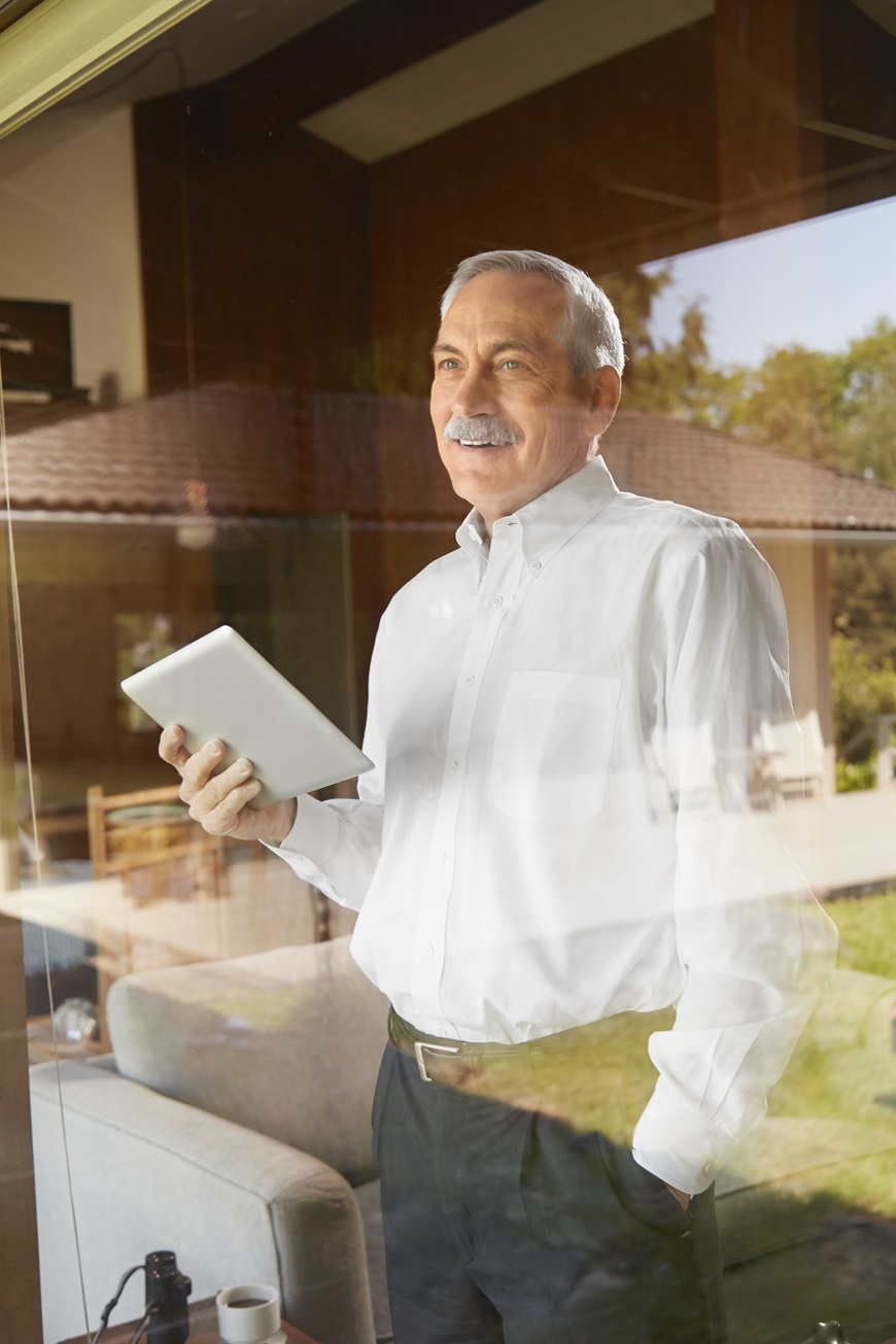 Residential Property Owner holding a tablet